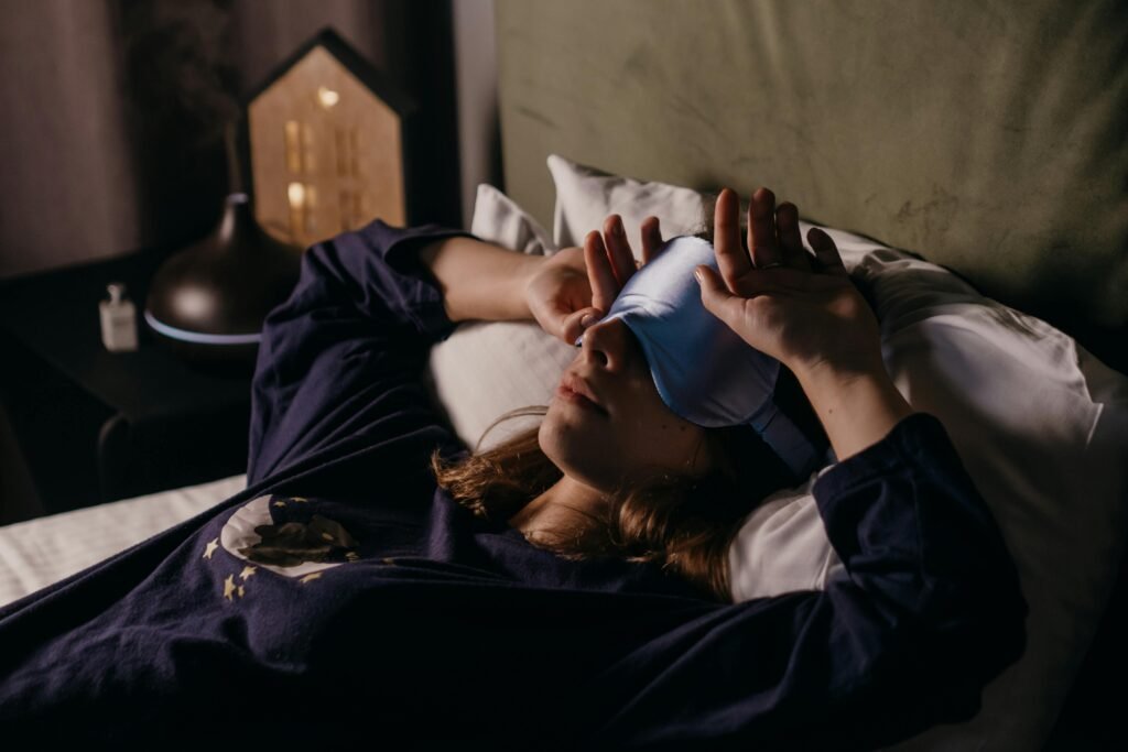 A Woman Wearing a Sleep Mask